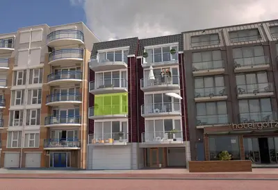 an apartment building with balconies on a city street at Boulevard Suites in Egmond aan Zee