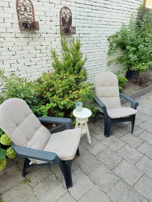 two chairs and a table on a patio at BNBSpanbroek in Spanbroek