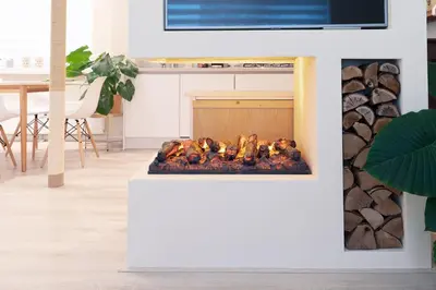a fireplace with animals on it in a living room at Kustappartementenkatwijk 2F in Katwijk aan Zee