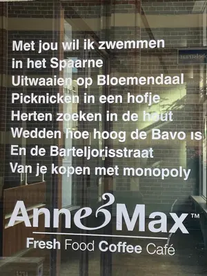 a sign in the window of a restaurant at GuesthouseOne in Haarlem