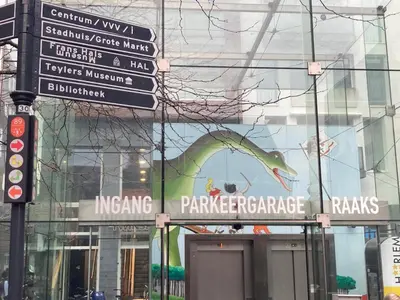 a building with signs on the side of it at GuesthouseOne in Haarlem
