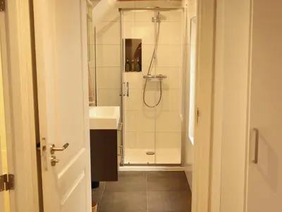 a bathroom with a shower and a sink at Coolest Apartments in Haarlem City - close to Beach and Amsterdam in Haarlem