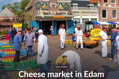 a group of people standing around a market with produce at Characteristic two bedroom home in Edam