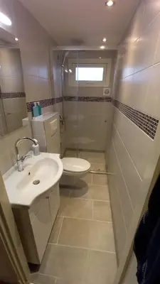 a bathroom with a sink and a toilet at Rekerlanden 241 in Schoorldam