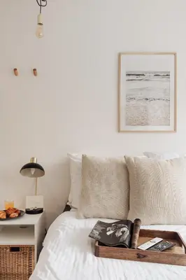 a bedroom with a bed with a tray on it at Luxurious Private Studio Amsterdam Zuid in Amsterdam