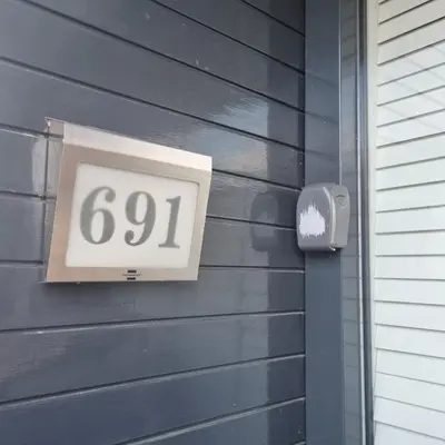 a house with a sign on the side of it at Luxurious Private Studio Amsterdam Zuid in Amsterdam