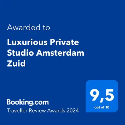 a blue sign with the text awarded to luxurious private studio americanagan zulu at Luxurious Private Studio Amsterdam Zuid in Amsterdam