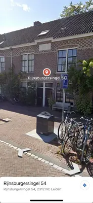 a group of bikes parked in front of a building at ‘T Singeltje in Leiden