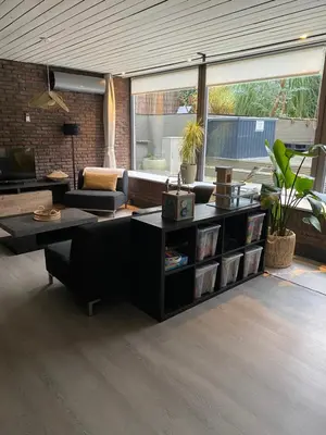 a living room with a couch and a table at By Balu in Soest