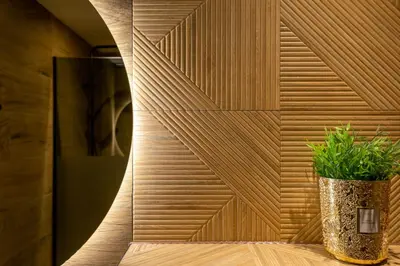 a wooden wall with a vase with a plant in it at Luxe Studio Liemers in Lelystad