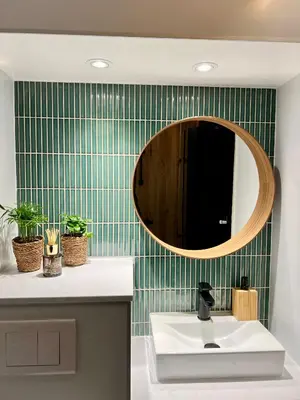 a bathroom with a sink and a mirror at NEW - Private Cabin - on a lake near Amsterdam in Vinkeveen