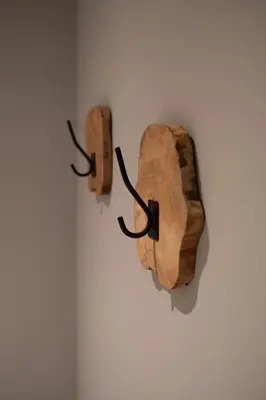 a wall with two wooden horns on a wall at B en B Volendam in Volendam