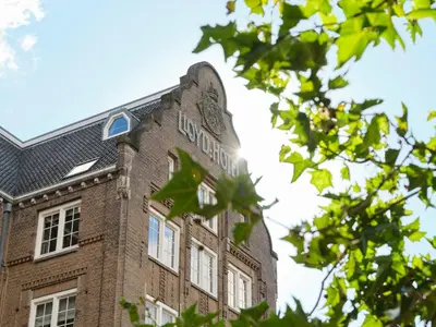 a brick building with a sign on top of it at The Hoxton Lloyd Amsterdam City Centre East in Amsterdam