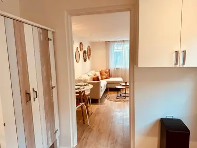 a living room with a couch and a table at Wellness at Sea in Egmond aan Zee