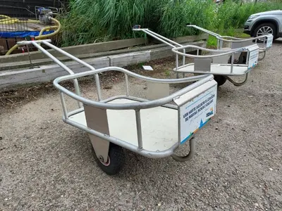 a trolly cart sitting on the ground at Houseboat De Amstel in Monnickendam