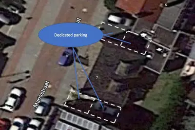 a map of a parking lot with a deficit parking at 30 steps to sand.. Light and spacious family villa in Zandvoort