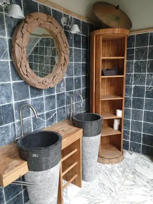 a bathroom with two sinks and a mirror at Landlust in Purmerend